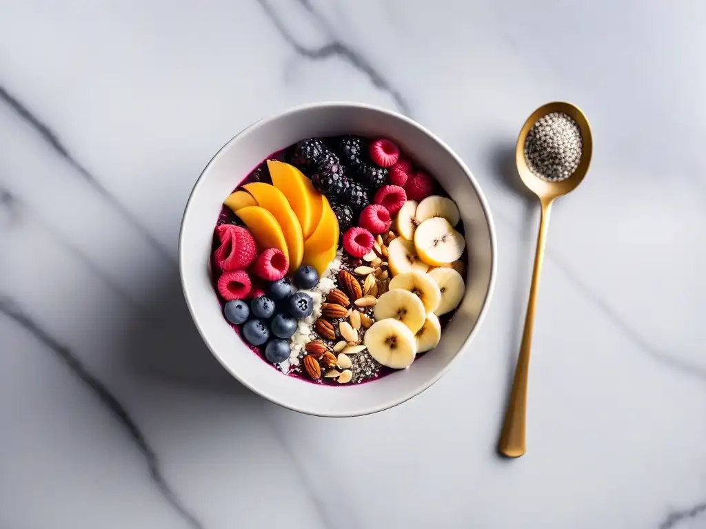 Un delicioso bowl de açaí vegano con frutas frescas y semillas, sobre un elegante mostrador de mármol con frutos secos