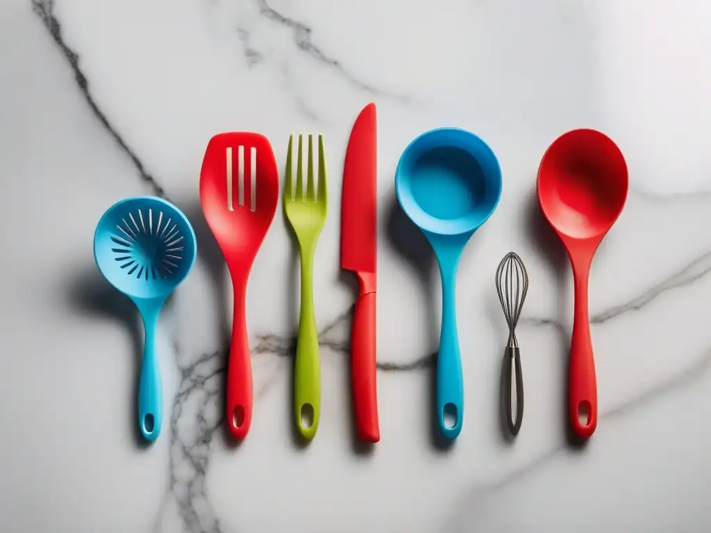 Utensilios de cocina de silicona en colores vibrantes sobre una encimera de mármol, ideal para cocina vegana